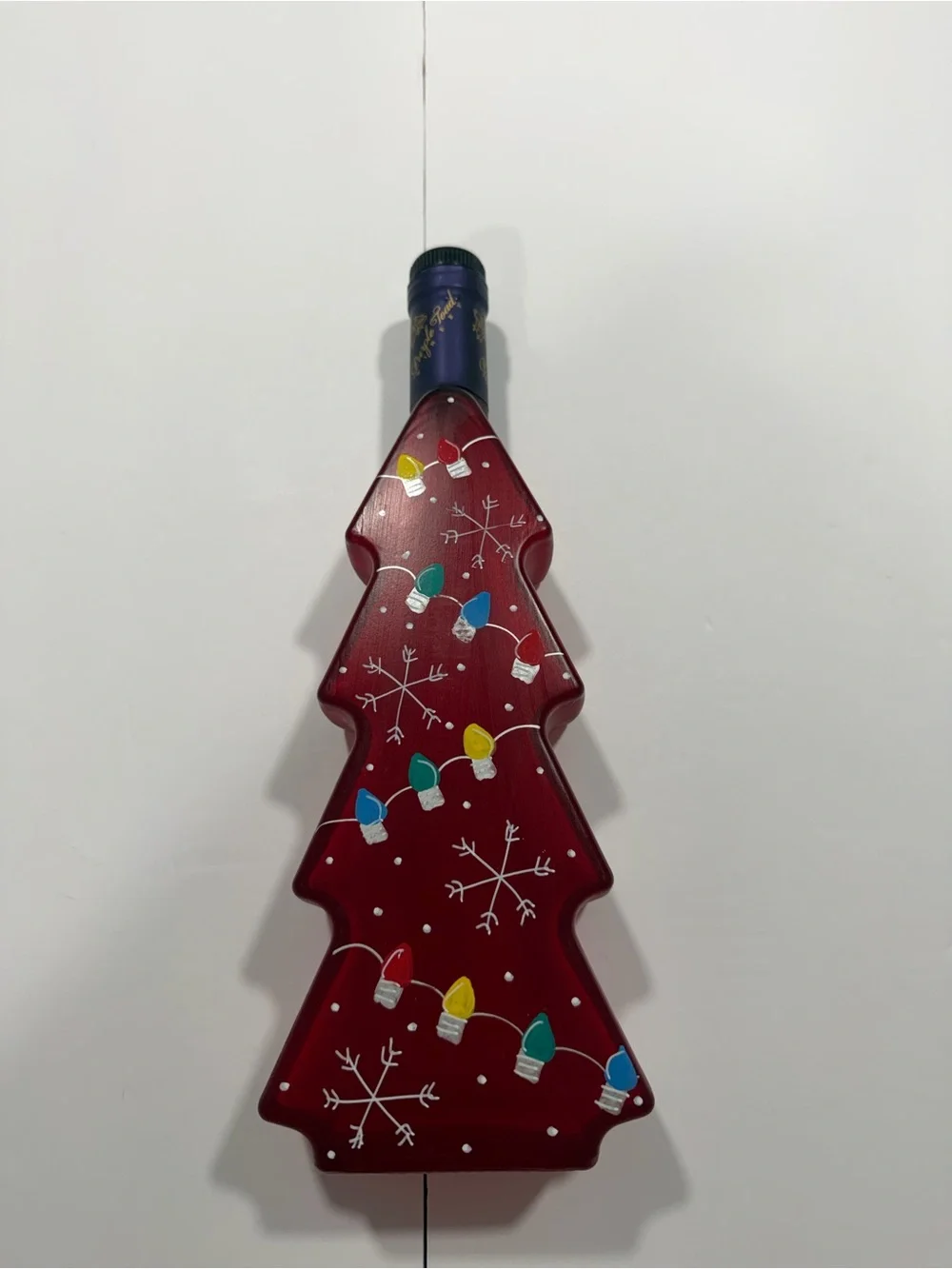 Red Tree-Shaped Holiday Ornament Bottle with Light Motif